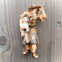 Pastier s oveckou figurky do Betlehema