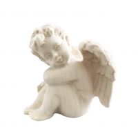 Anjel sediaci vľavo