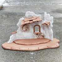 Drevený domec so svetlom pre Betlehem