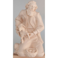 Shepherd kneeling with sheep Tyrolean