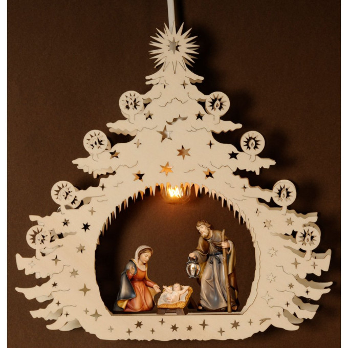 Christmas tree with Holy family and light