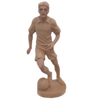 Wooden statue of a football player