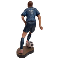 Wooden statue of a football player