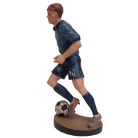 Wooden statue of a football player