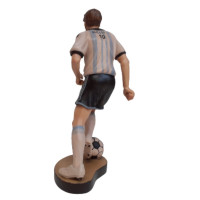 Wooden statue of a football player