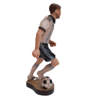 Wooden statue of a football player