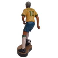 Wooden statue of a football player