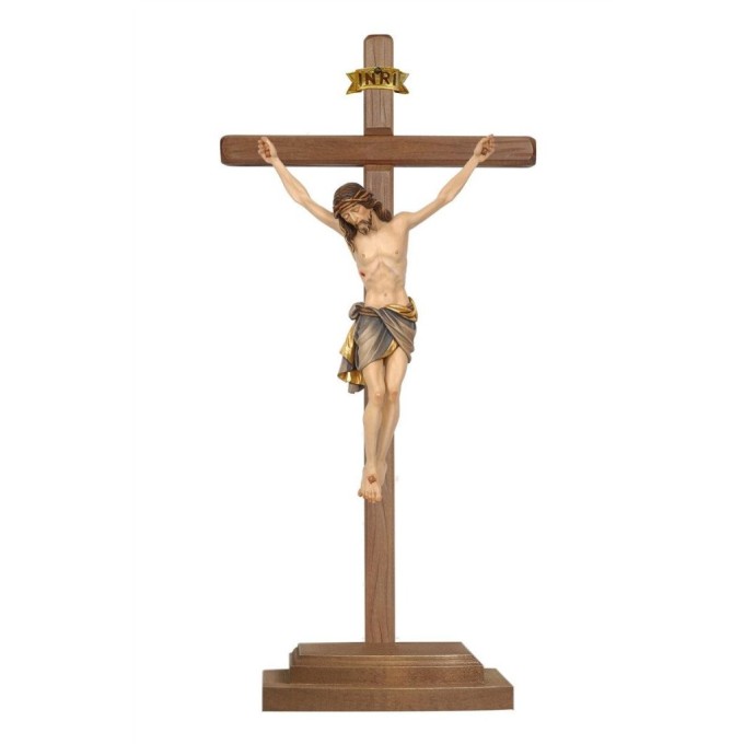Wooden cross on piedestal with Corpus Siena