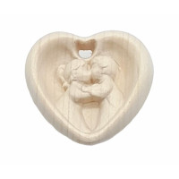 Wooden relief of kissing children