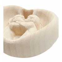 Wooden relief of kissing children