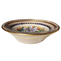 Wooden bowl with lily Heliotrope