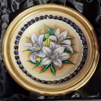 Wooden bowl with lily Heliotrope