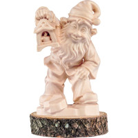 Gnome guardian on a wooden pedestal