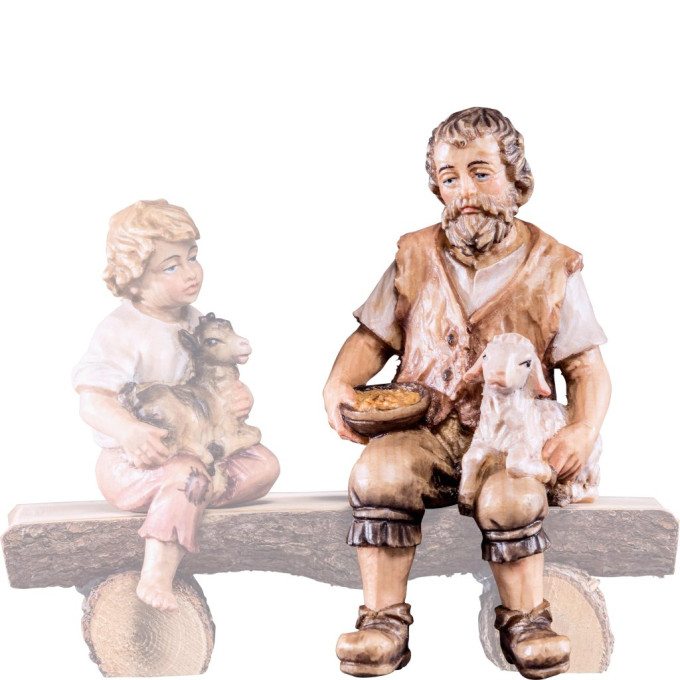 Shepherd sitting with lamb for Nativity scene - Rives