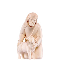 Shepherd kneeling with a sheep - Artis