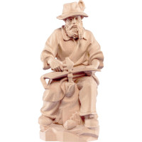 Farmer sitting woodcarving from lime wood