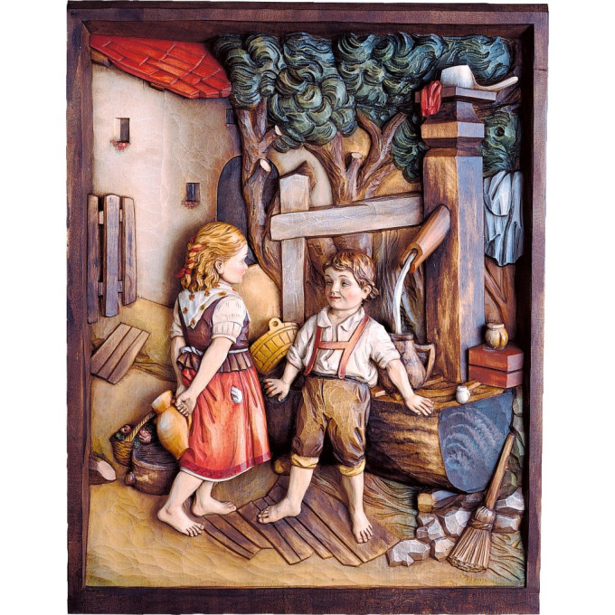 Wooden relief of children at the well