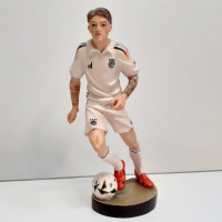 Football player wooden statue
