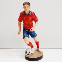 Football player wooden statue