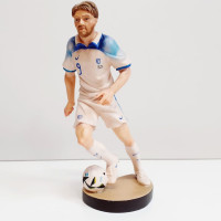Football player wooden statue