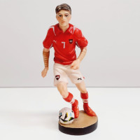 Football player wooden statue