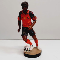 Football player wooden statue