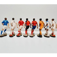 Football player wooden statue