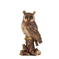 Owl on tree-trunk woodcarving
