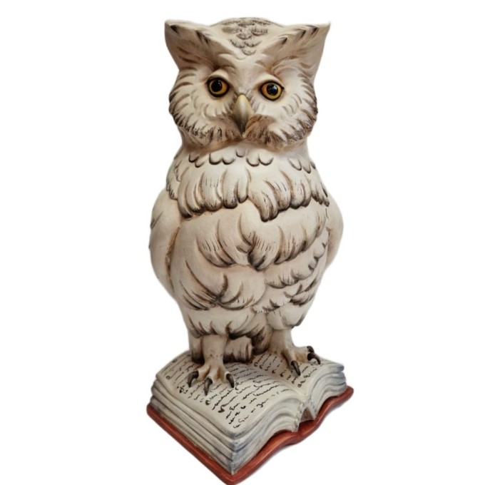 Wooden Owl on a book