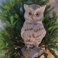Wooden Owl on a book
