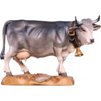 Sivá krava drevená socha